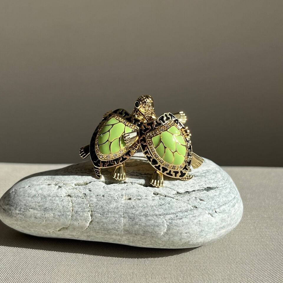 Pırlanta işçiliği mineli yavrulayan caretta xuping küpe